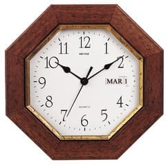 Horloge murale à calendrier en bois teinté noyer patiné filet doré
